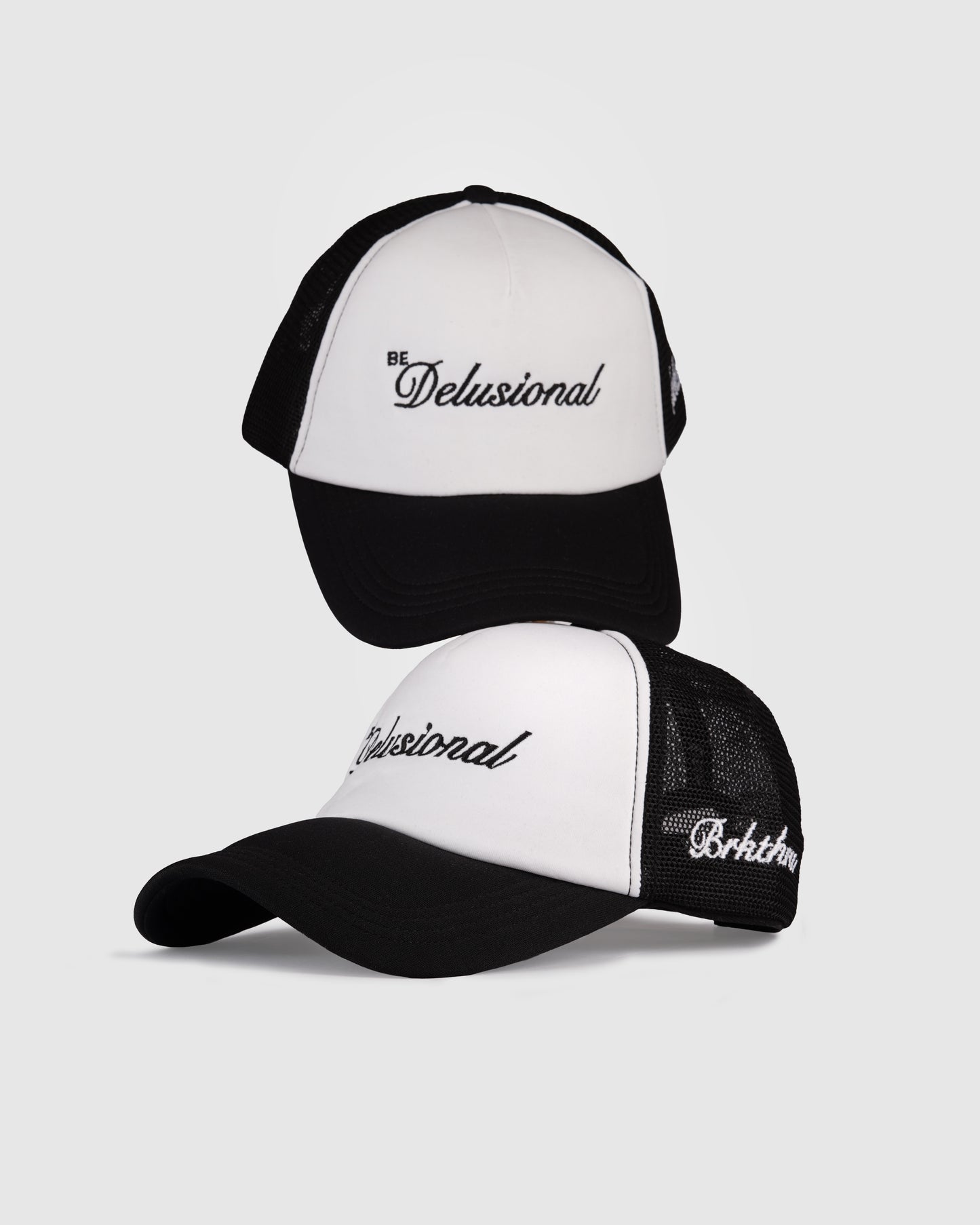 'Be Delusional' Trucker hat